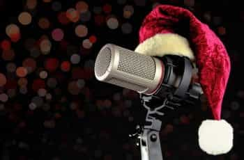 A Santa hat sitting on a microphone.